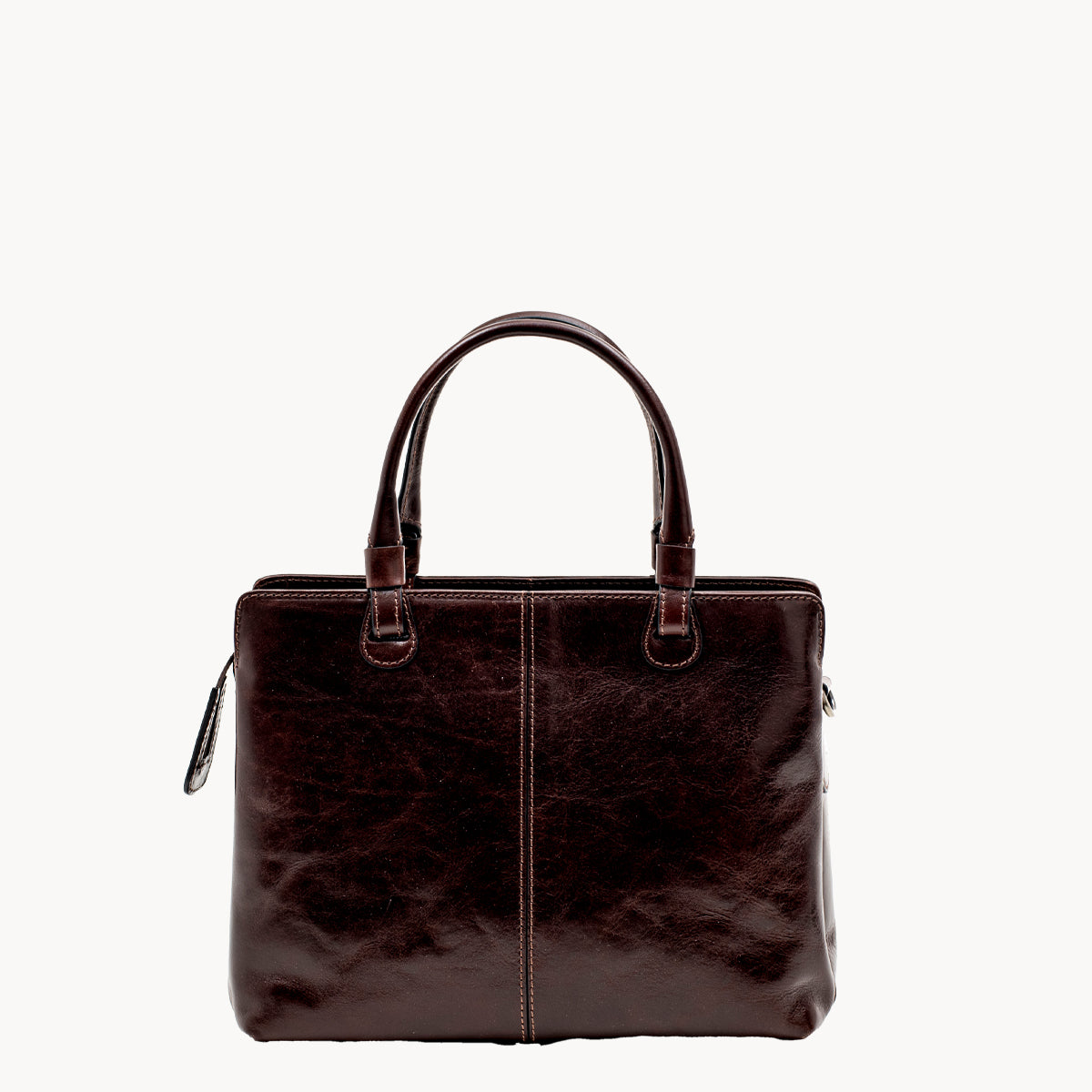 Brown leather grab bag on a white background