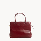 Red handbag on a white background