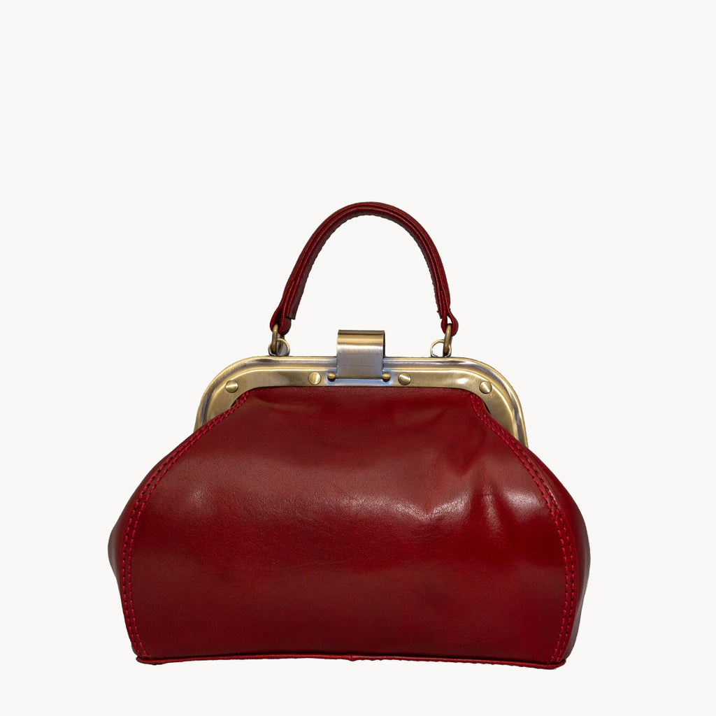 Gianni Conti Small Leather Gladstone Bag - Doctor's Bag in Red - lifestyle shot showing compact elegant style
