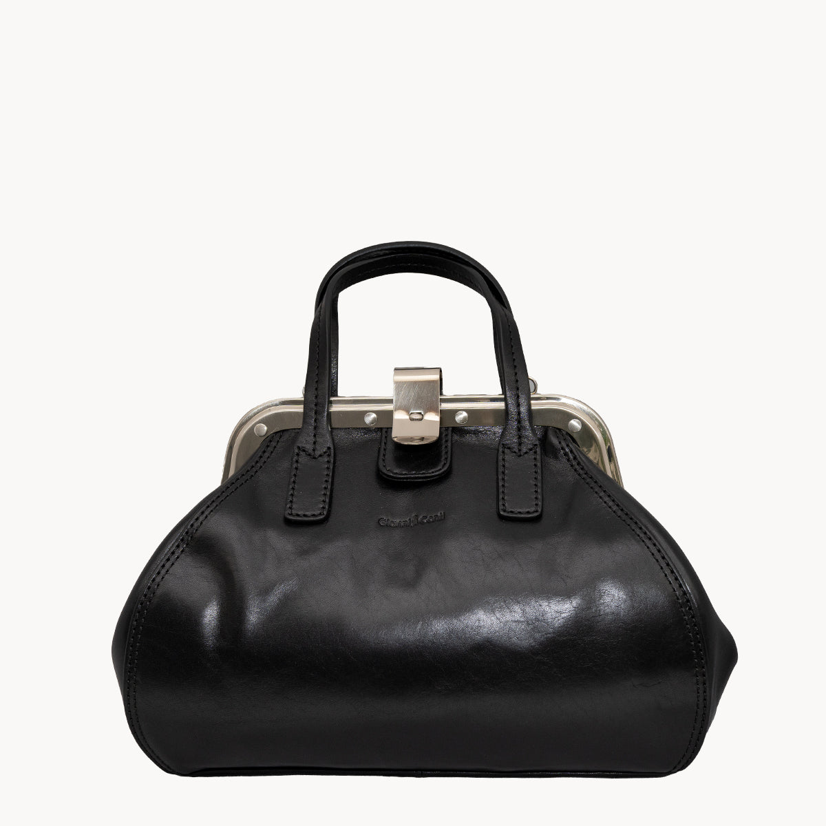 Black handbag with a silver clasp on a white background