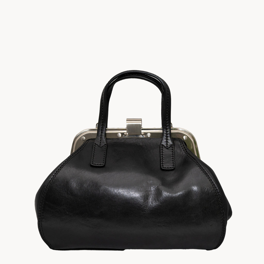 Black handbag with a metallic clasp on a white background