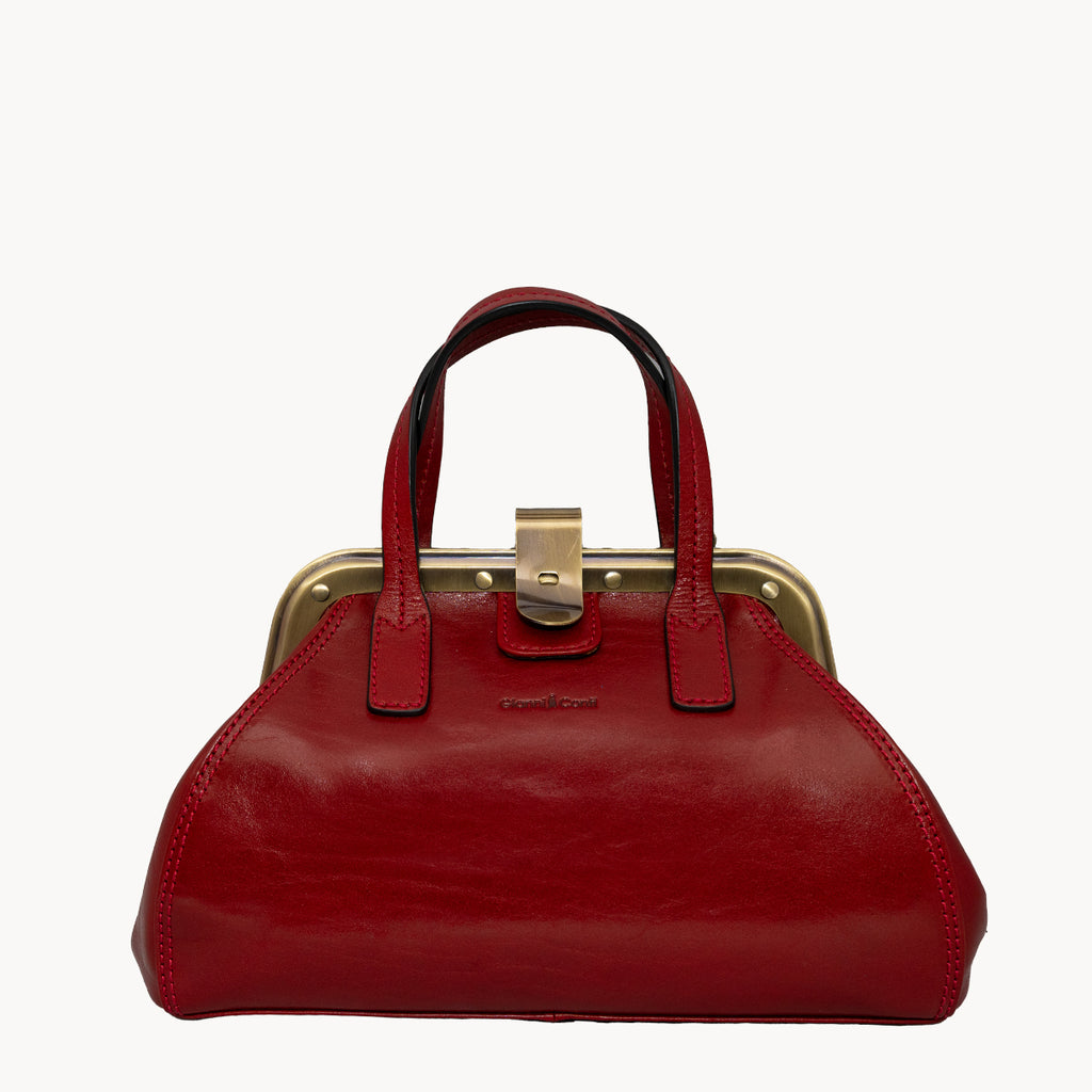 Red handbag with a gold clasp on a white background