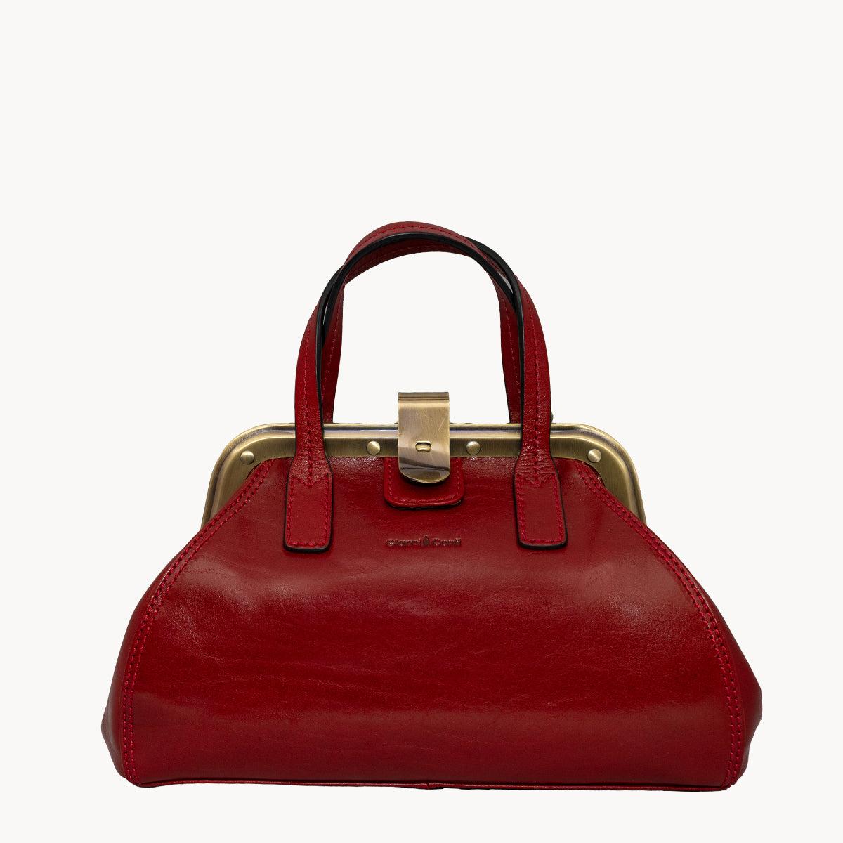 Red handbag with a gold clasp on a white background