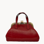 Red handbag with a gold clasp on a white background