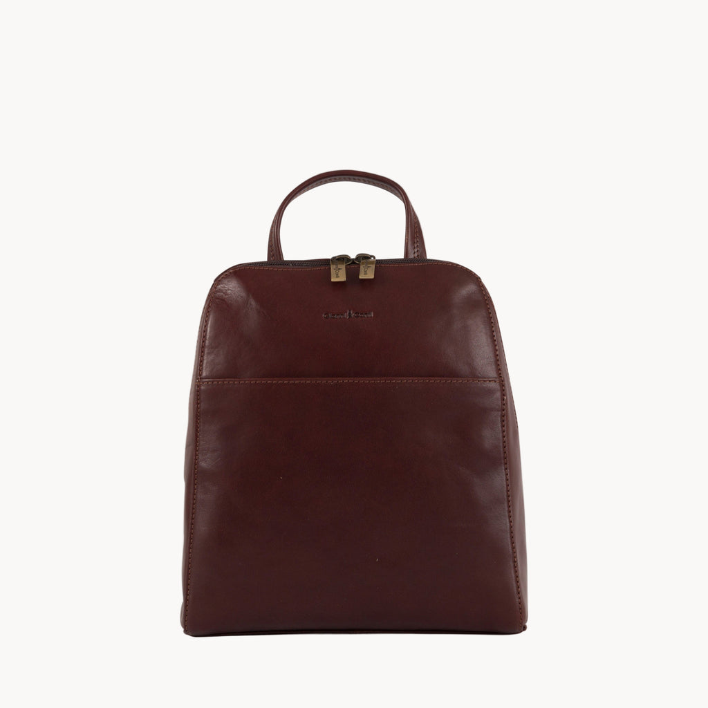 Brown leather backpack on a white background