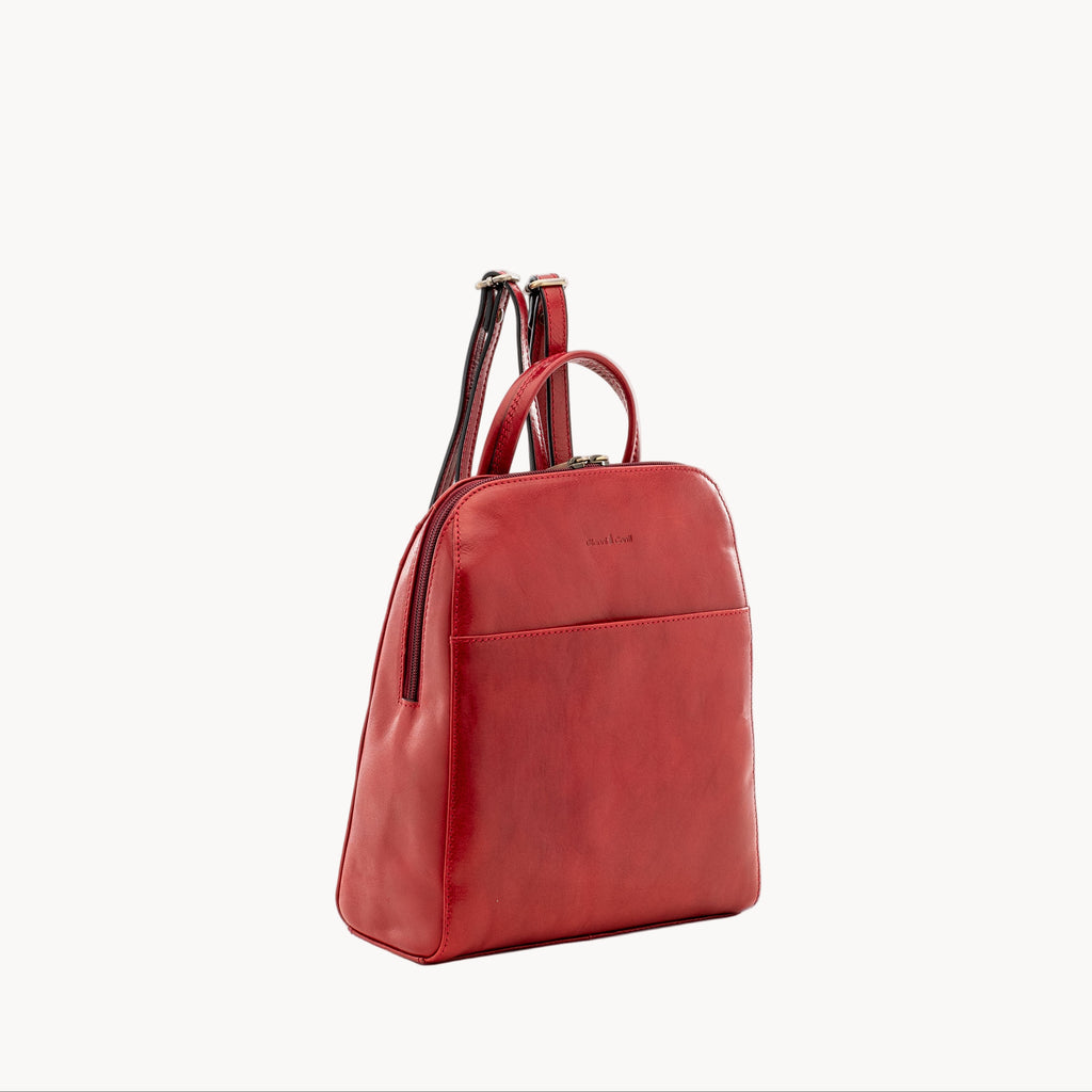 Red backpack on a white background