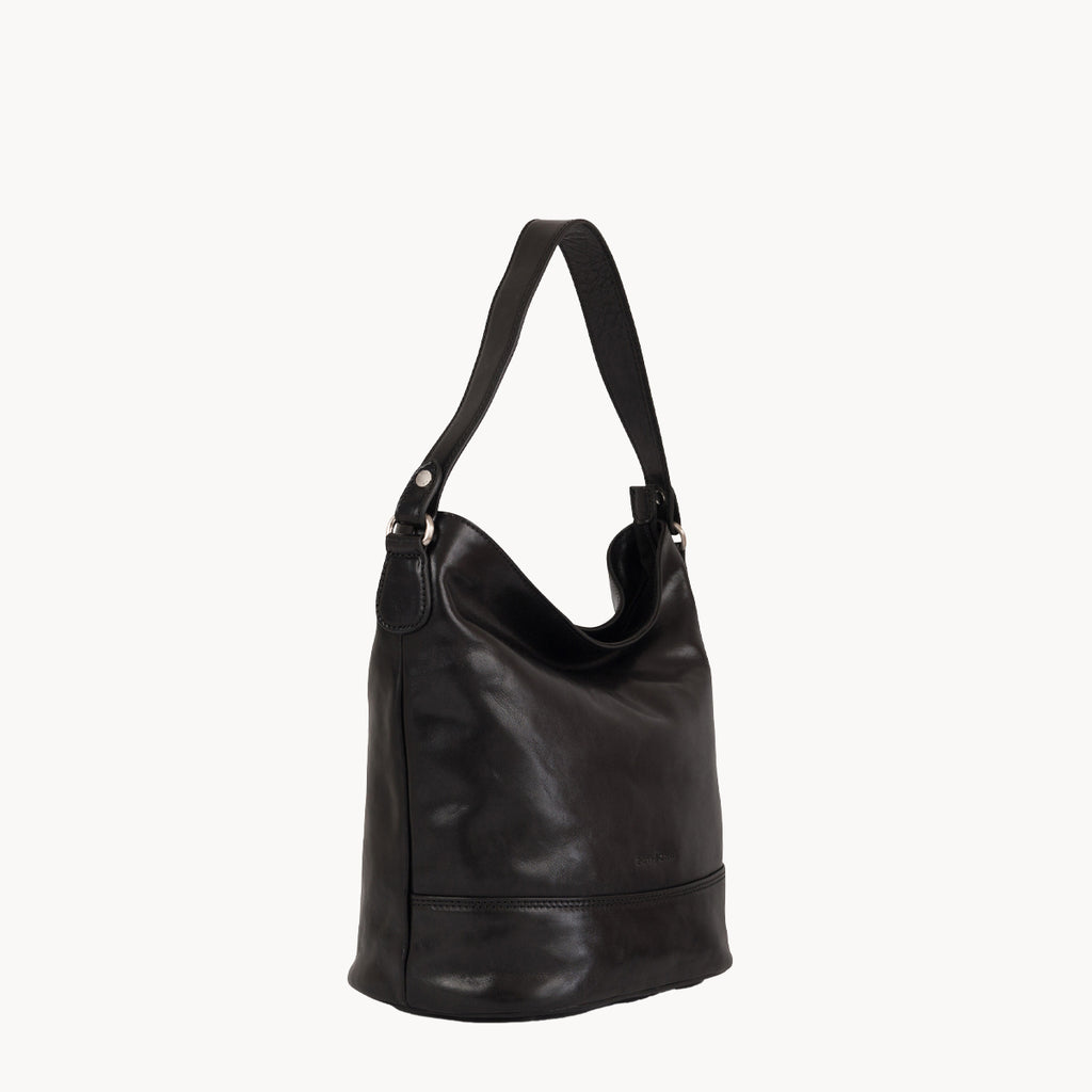 Black leather handbag on a white background
