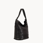 Black leather handbag on a white background
