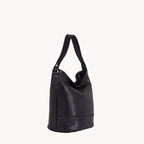 Blue leather handbag on a white background