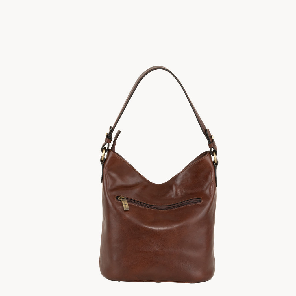 Brown leather handbag on a white background
