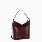 Brown leather handbag on a white background