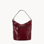 Red handbag with a gold zipper on a white background