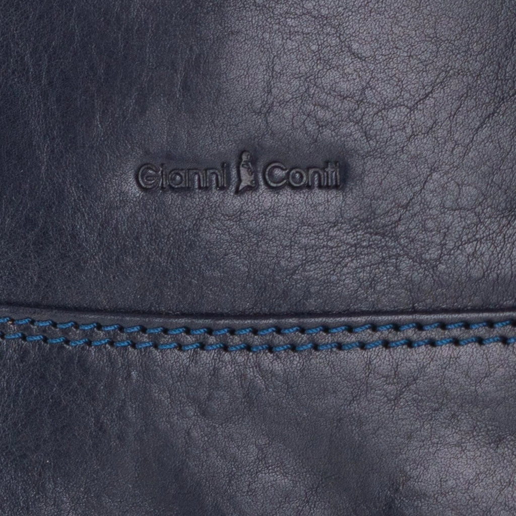 Close-up of a dark blue leather handbag with 'Gianni Conti' branding.