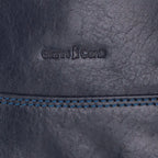 Close-up of a dark blue leather handbag with 'Gianni Conti' branding.