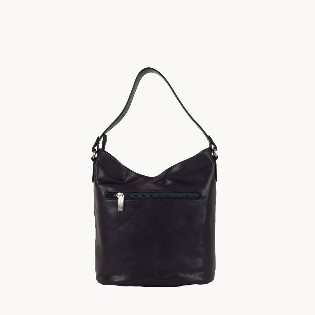 Blue leather handbag with a visible zipper on a white background