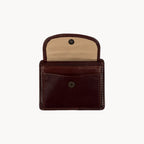 Brown leather wallet open on a white background