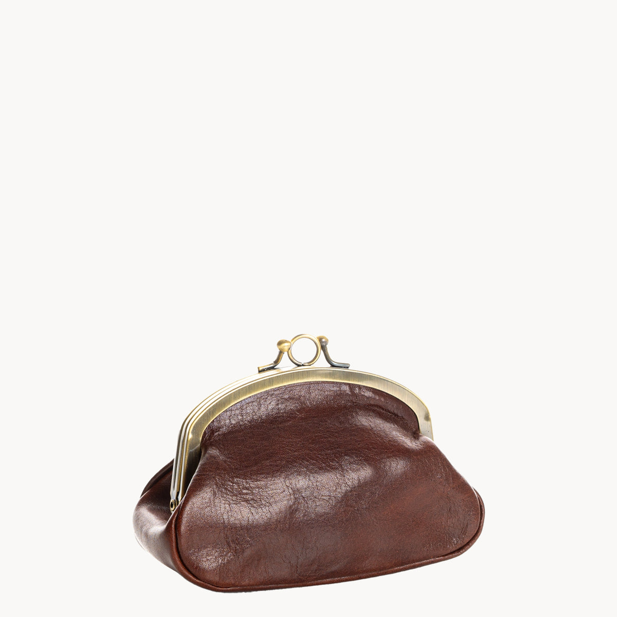 Brown leather coin purse with gold clip clasp on a white background