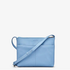 Blue handbag with a strap on a white background