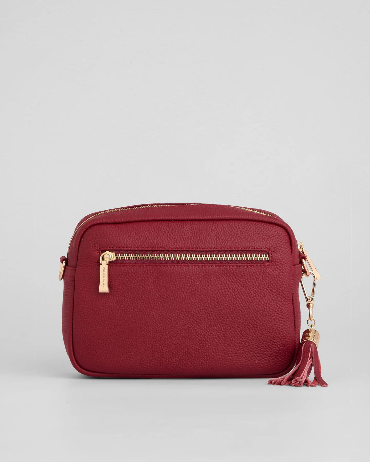 Burnt Rhubard red pebble leather crossbody bag with tassle and gold hardward - back view