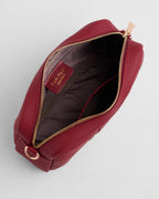 Burnt Rhubard red pebble leather crossbody bag with tassle and gold hardward - inside view