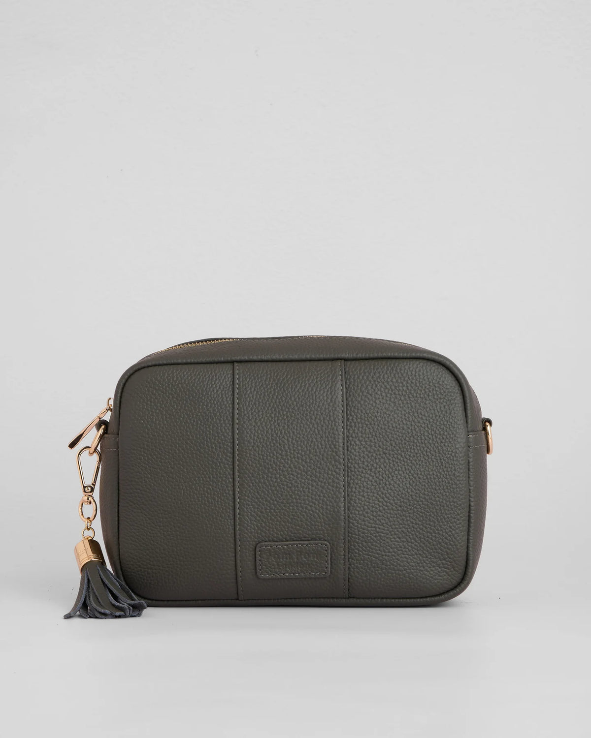 Volcano Grey pebble leather crossbody bag with tassle and gold hardward