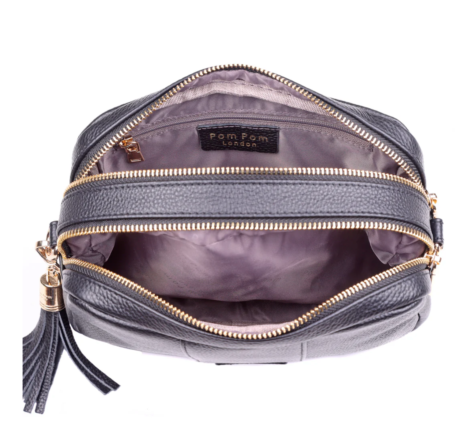 Gray handbag with gold zippers and a tassel on a white background, featuring the brand 'Pom Pom London'.