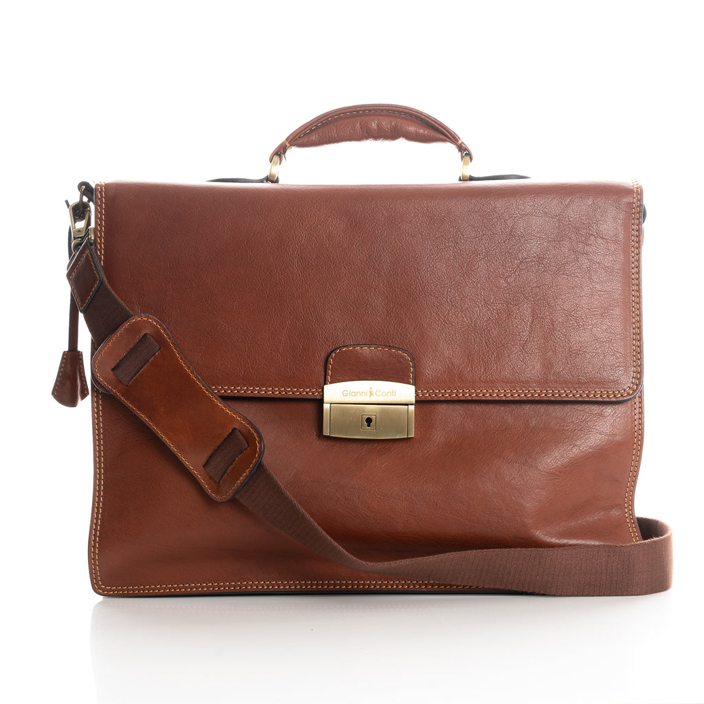 Front view tan leather briefcase with top handle and long crossbody strap