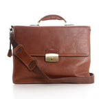 Front view tan leather briefcase with top handle and long crossbody strap