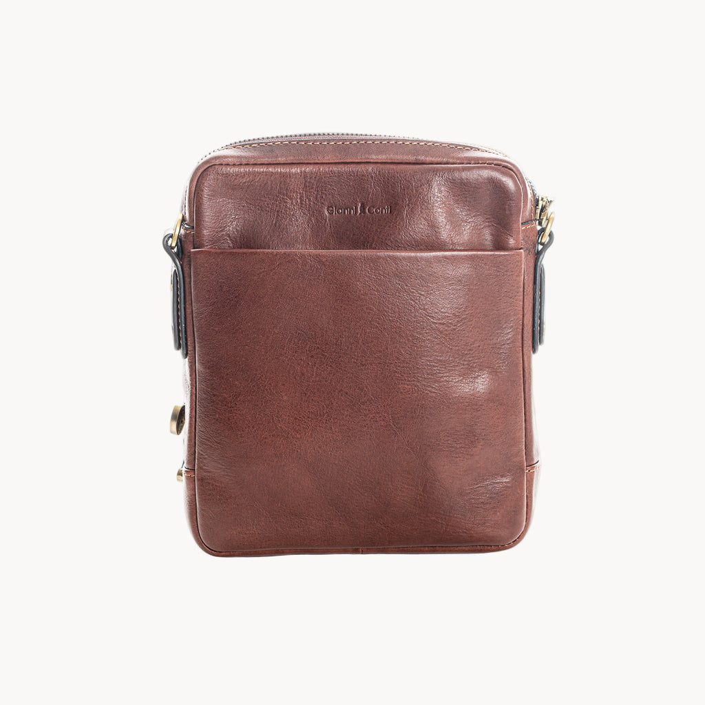 Brown leather crossbody bag on a white background