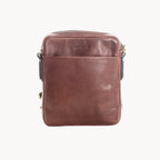 Brown leather crossbody bag on a white background
