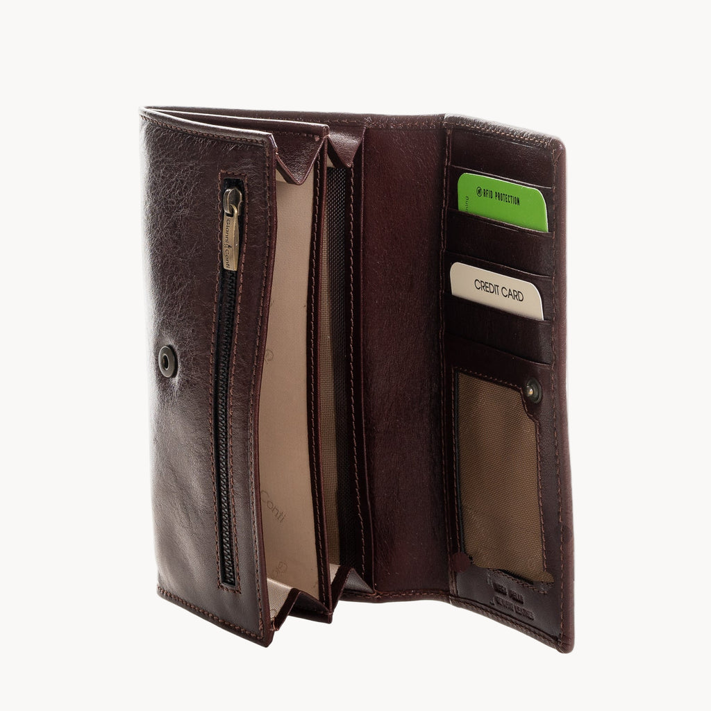 Brown leather wallet with card slots on a white background
