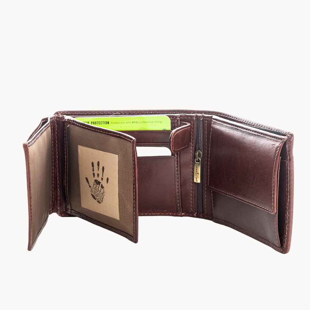 Brown leather wallet with a handprint design on a white background