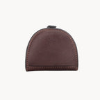 Brown leather coin purse on a white background