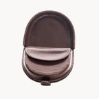 Brown leather coin purse on a white background