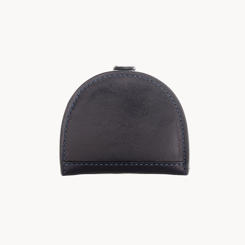 Blue leather coin purse with visible stitching on a white background