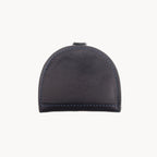 Blue leather coin purse with visible stitching on a white background