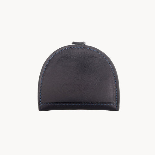 Blue leather coin purse with visible stitching on a white background