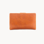 Tan leather wallet on a white background