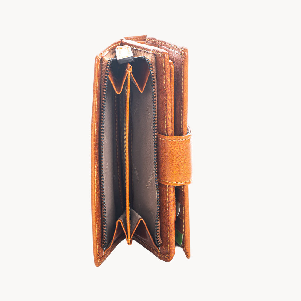 Tan leather wallet open on a white background