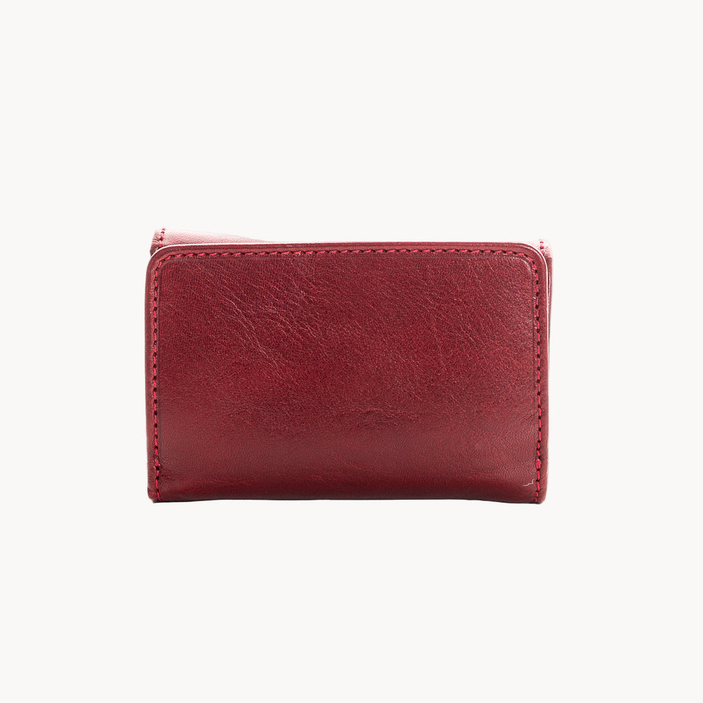 Red leather wallet on a white background