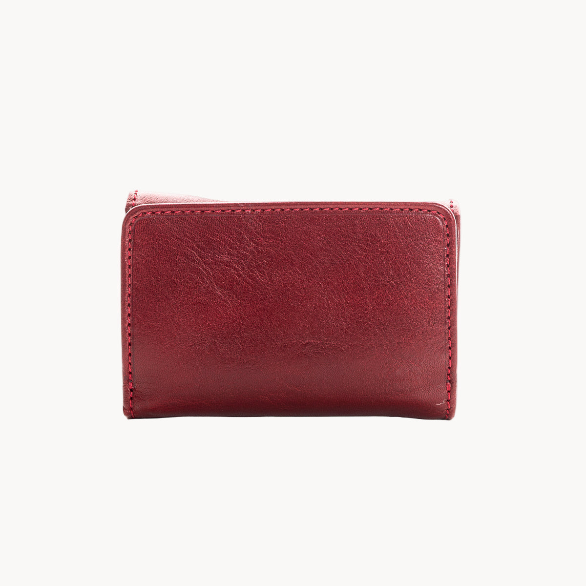 Red leather wallet on a white background