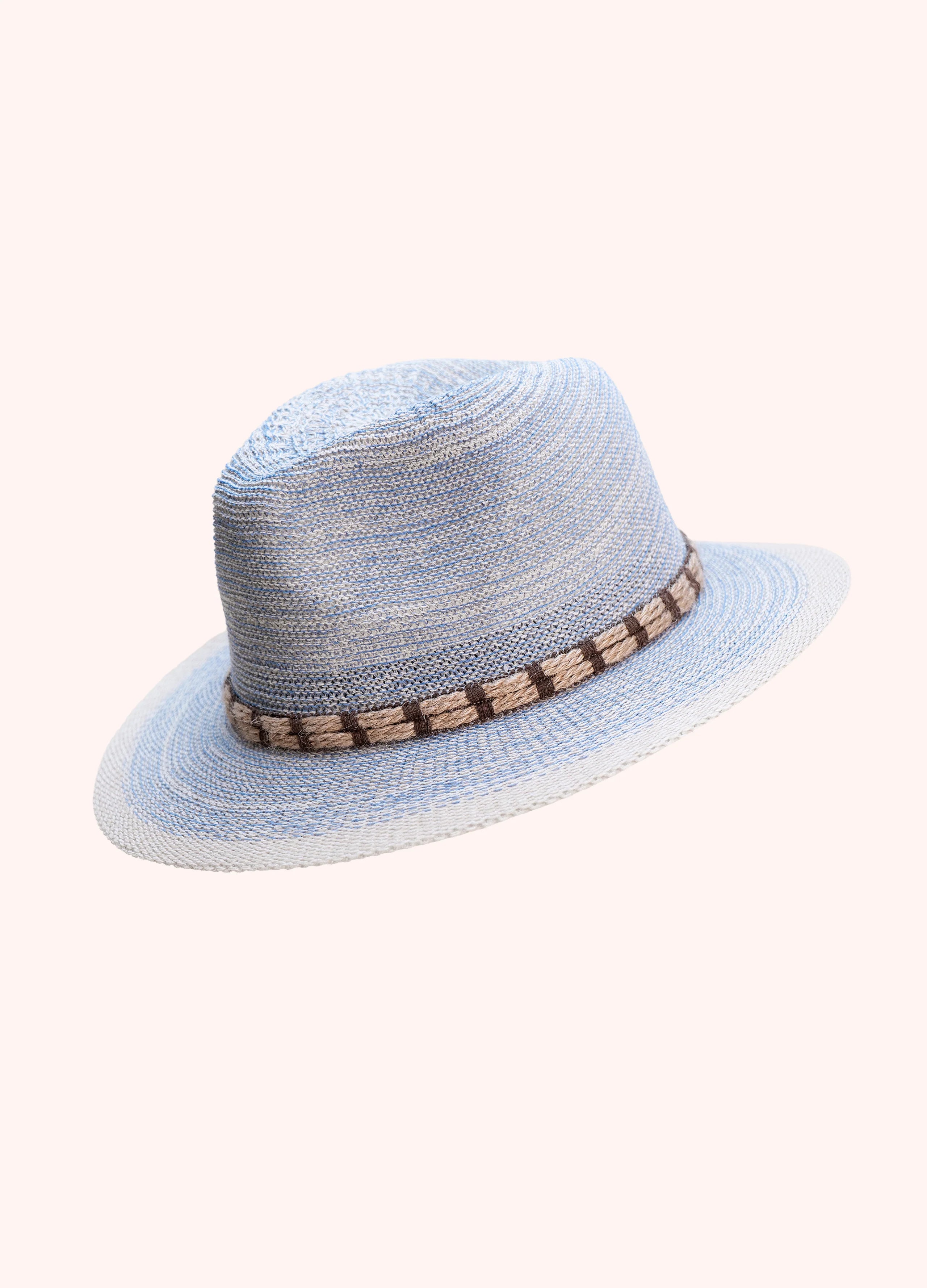 Blue straw hat with a brown band on a white background