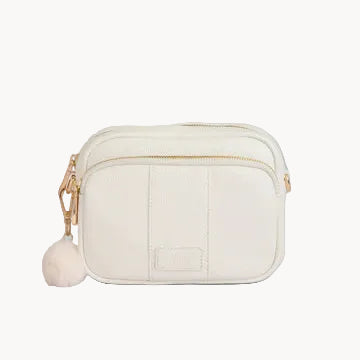 White crossbody bag with gold zipper on a gray background