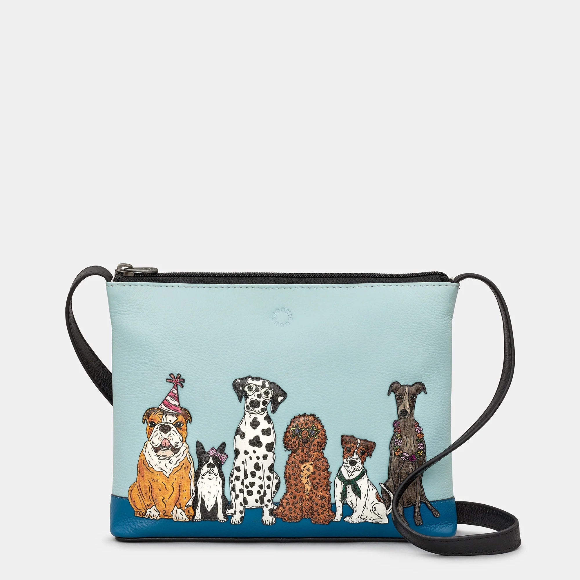 Crossbody bag with illustrations of dogs on a light blue background