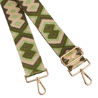 Patterned strap with gold hardware on a white background