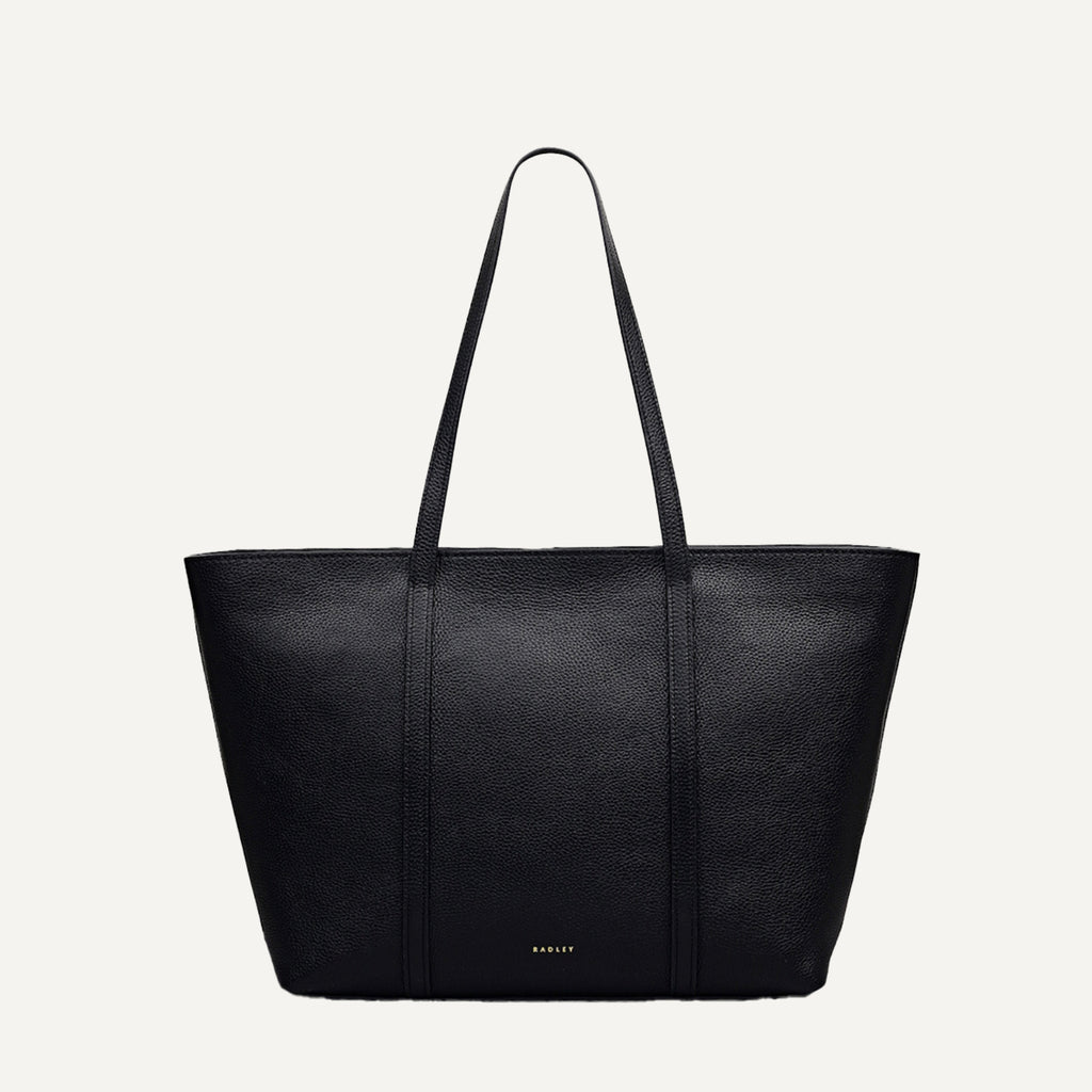 Black tote bag on a light gray background