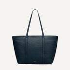 Teal tote bag with Radley branding on a light gray background