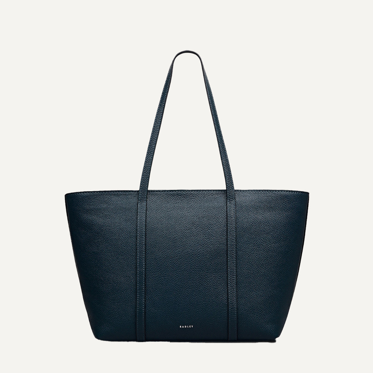 Teal tote bag with Radley branding on a light gray background