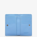 Blue leather bi-fold purse with appliqué flower and bee detail - inside view, 10 credit card slots