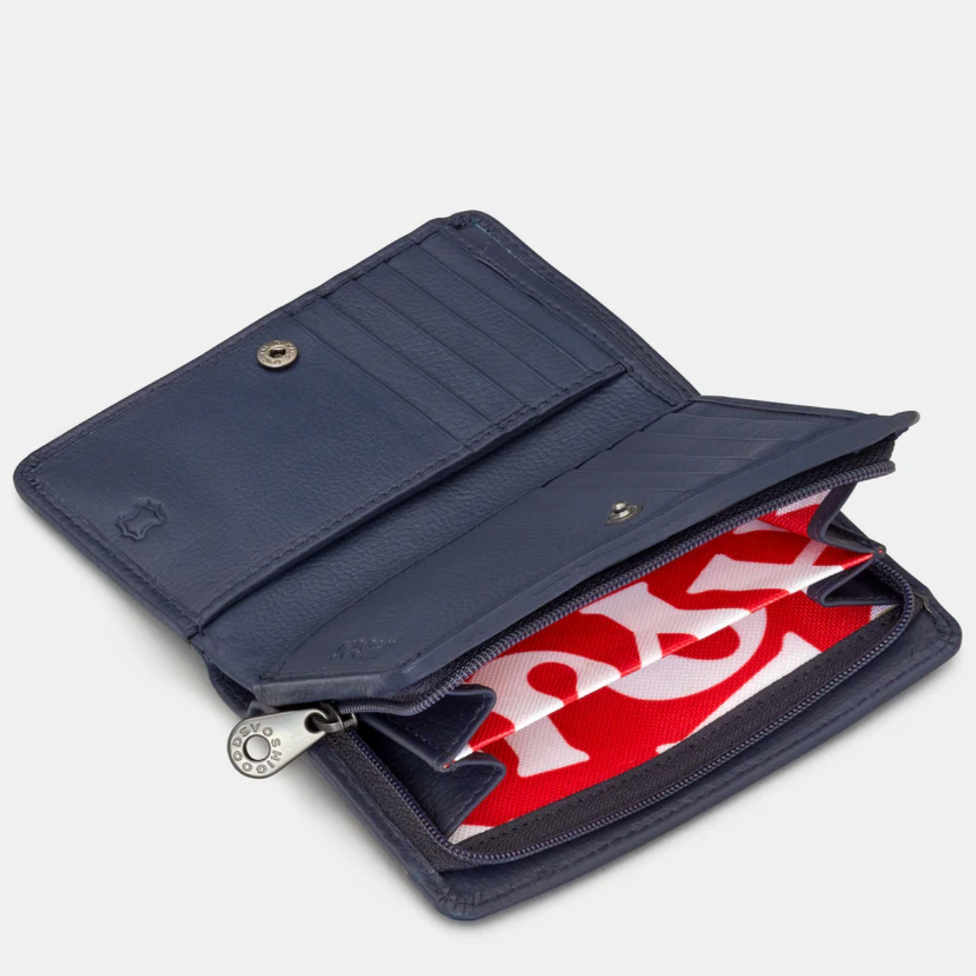 Open navy blue wallet with red and white interior on a light gray background